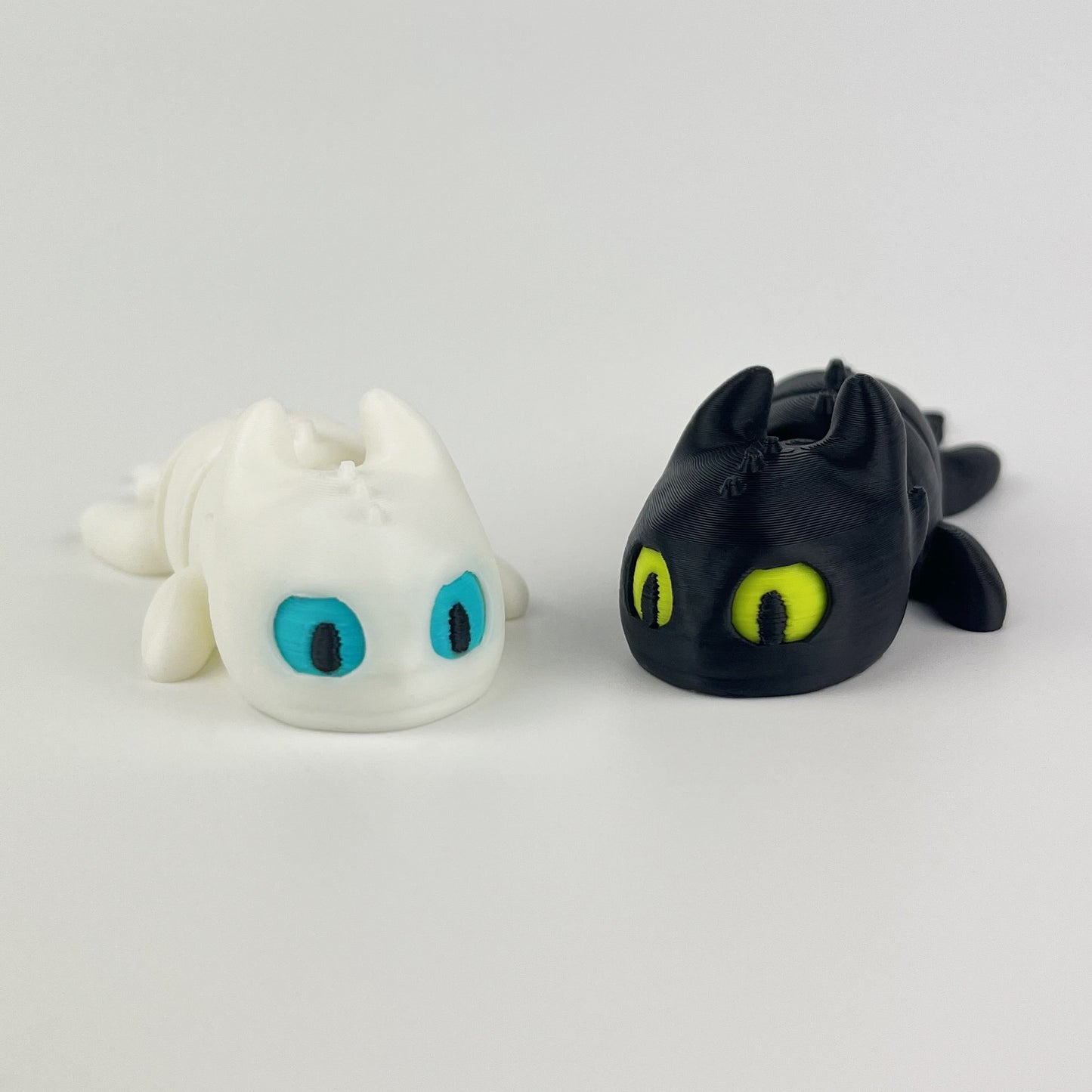Set Figurine 3D Baby Dragons Toothless si LightFury – How to Train Your Dragon, 8 cm