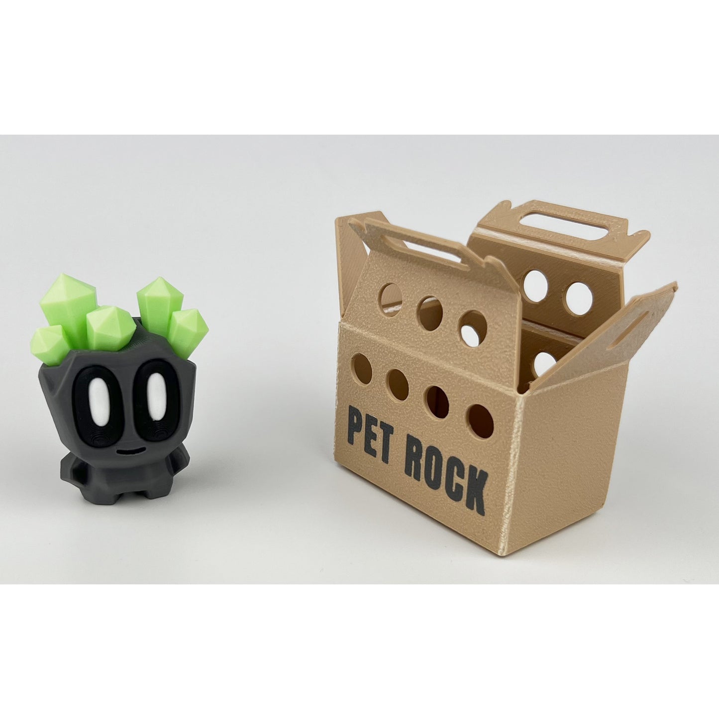 Figurina Pet Rock 3D, cu Cristale Fosforescente si Cutie de Depozitare
